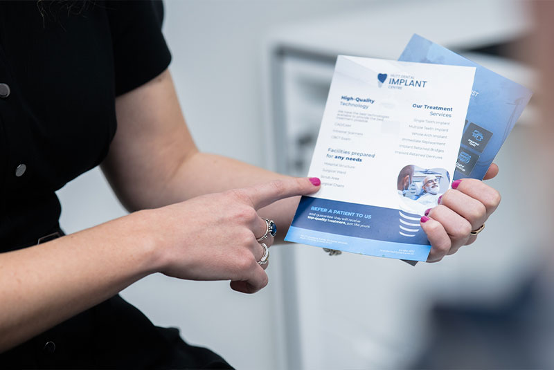 team member going over insurance and financing with patient