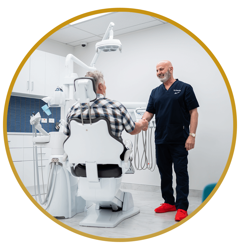 Dr. Hamid Al-Hassin having a consultation with patient