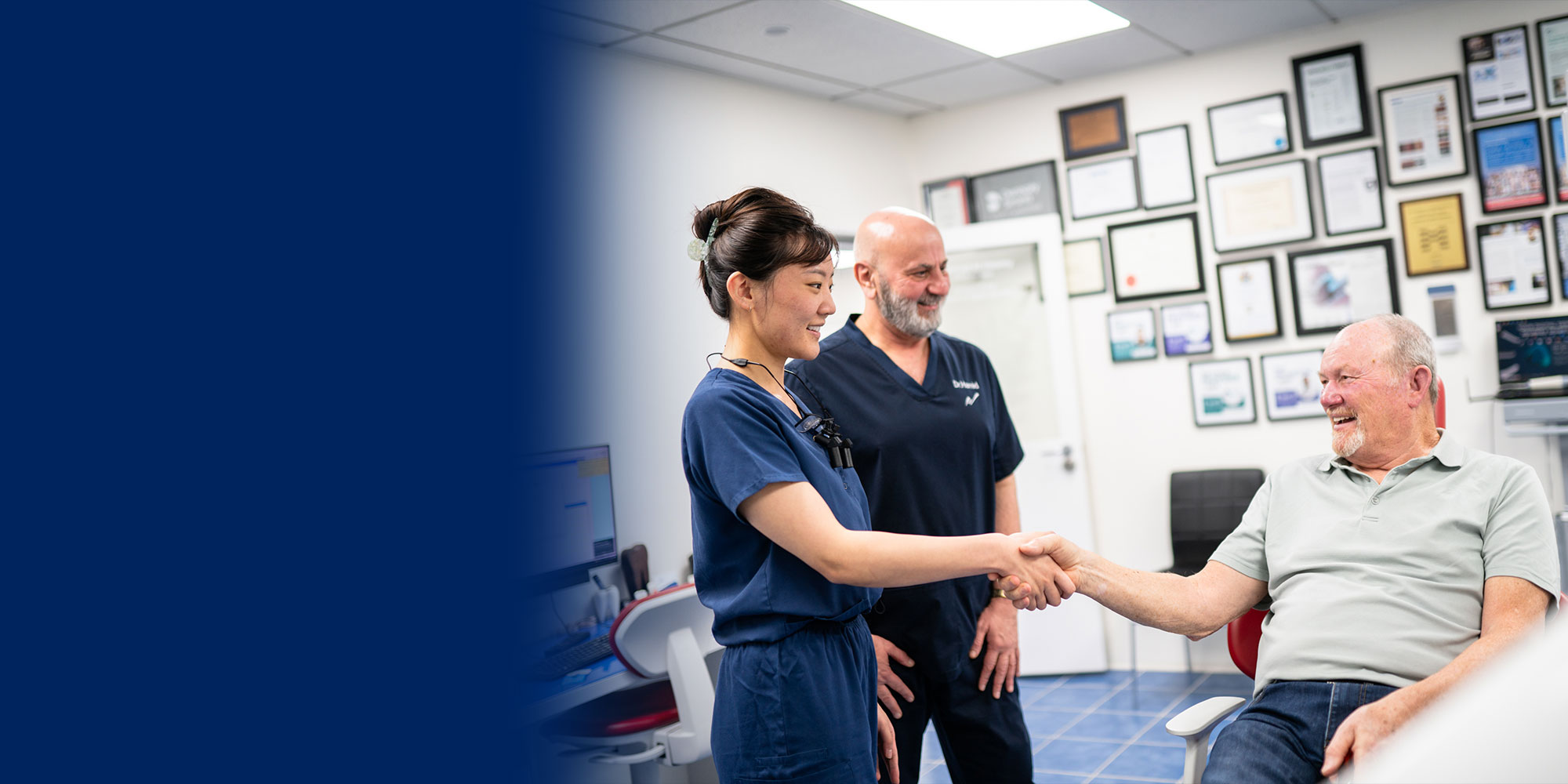 Dr. Maria Chen and Dr. Hamid Al-Hassin shaking patients hand talking about sedation to patient